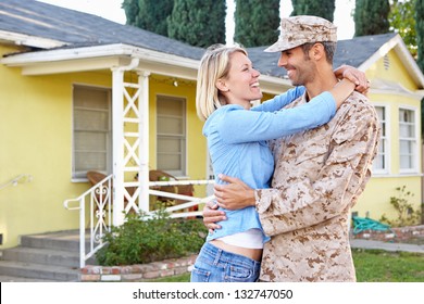 Wife Welcoming Husband Home On Army Leave - Powered by Shutterstock