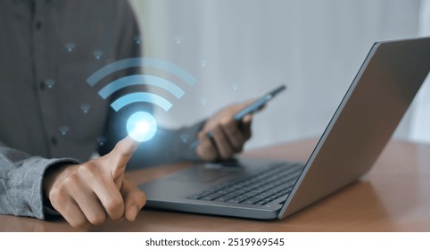 Wifi icon on businessman's hand, wireless communication concept, business, society, global - Powered by Shutterstock