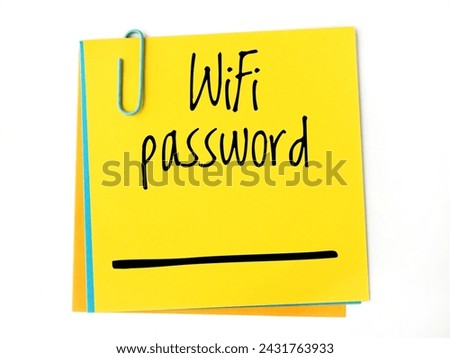 wifi password text and empty space on a yellow sticky note 