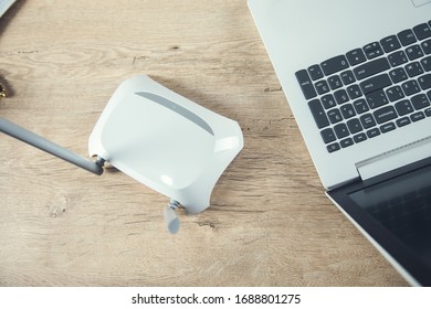 Wifi router and computer on the table
