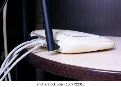 Wi-Fi Router On The Table Shelf Close Up