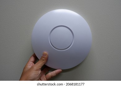 Wifi Router Or Wireless Access Point Omni Type Setup At Ceiling For Internet Connection Space.