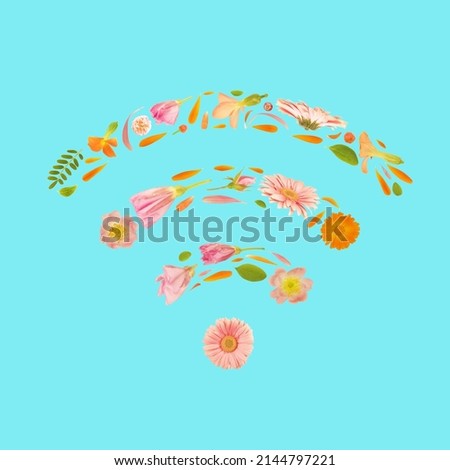 Wi-Fi sign wireless network protocol sign made of beautiful flowers. Symbol of internet access signal floral icon on pastel vivid bright green background. Digital web connection concept idea