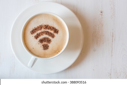 WiFi Symbol Made Of Cinnamon As Coffee Decoration On Cup Of Cappuccino. 