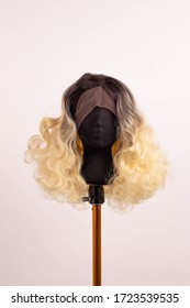 Wig Blond Ombre Hair On A Mannequin On A White Background