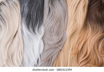 Wigs, natural and synthetic hair. Women's beauty concept. Close up photo of wig, hair for ladies