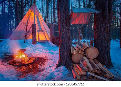 Wigwam in Karelia. Winter in Russia. Camping site in karelia. Ecotourism in Russia. Parking for ecotourists in Karelia. Winter in forests of Priozersk. Wigwam in morning Taiga. Northern nature Russia