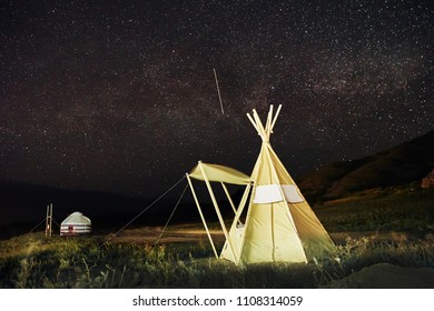 Wigwam And Yurt In The Steppes Of Kazakhstan Under The Stars Night