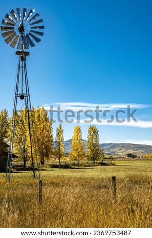 WIind mill in the Yampa Valley with fall foliage