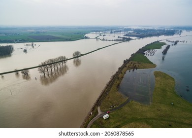 Wijk bij Duurstede, The Netherlands - Januari 2018: Extremely high water floods at Wijk bij Duurstede, where the river The Rhine turns into De Lek. The high waters flooded a big area of farm land. 