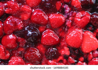 Wild Berries In Jelly Top Down View For Background. Berry Pie Close Up.