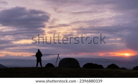 Similar – Wanderer am Polarmeer in Mitternachtssonne