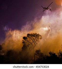                                Wild Fire Dowsed By The Local Fire Rescue Helicopter Unit