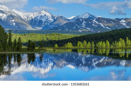 Wild Mountain Lake In The Altay Mountains. Summer Landscape, Beautiful Reflection. Travels In Russia.