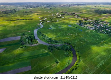 Wild Nida River In Poland Countryside At Spring. Aerial Drone View