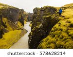 Wild river in chasm between two cliffs