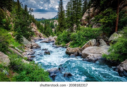Wild river waterfall in mountain forest