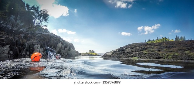 Wild Swim To Scottish Castle Toram Woman In Wetsuit