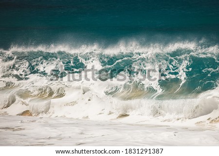 Similar – Aerial Panoramic Drone View Of Blue Ocean Waves Crushing On Sandy Beach in Portugal