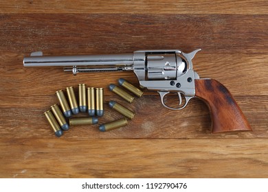 Wild West Revolver - Colt Single Action Army On Wooden Background