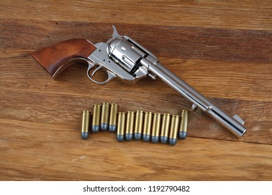 Wild West Revolver - Colt Single Action Army On Wooden Background