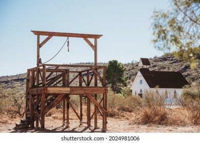 The Wild West. Wooden Gallows with noose on the old Church. Old Church in the Wild West, Arizona, USA. Buildings in historic cowboy ghost town, Arizona. Western old city in Phoenix, Arizona, USA.