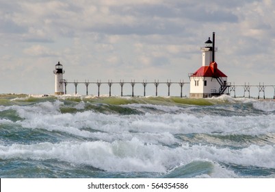 A wild and windy day churns up the waters of Lake Michigan by the St Joseph lighthouse.