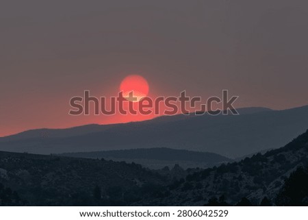 Wildfire enhanced sunset and cloudscape over Grass Valley in western Colorado on June 28, 2026.
