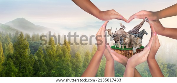 Wildlife Conservation Day. Or wildlife\
protection It\'s a diverse group of people who come together to\
build hands, hearts that connect to protect the environment. and\
promote conservation\
wildlife.