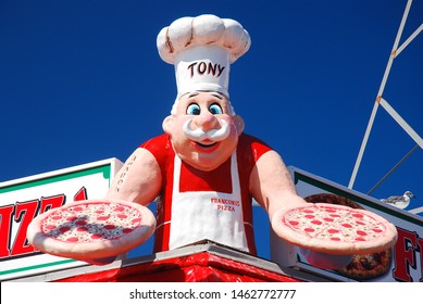 Wildwood, NJ, USA August 24 A Cartoonish Pizza Maker Lures Hungry Customers With Its Larger Than Life Sign Hanging Over The Boardwalk In Wildwood, New Jersey