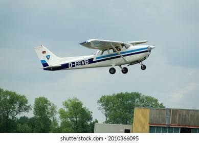 WILHELMSHAVEN, GERMANY - Jun 20, 2020: In flight shot of an old Cessna F172M taking off at the airfield of Wilhelmshaven