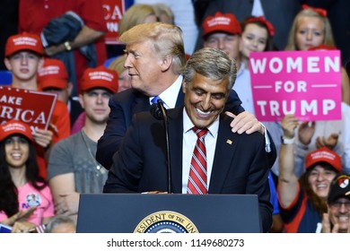 WILKES-BARRE, PA - AUGUST 2, 2018: President Trump Embraces Congressman Lou Barletta At A Campaign Rally For His Run For Senate.