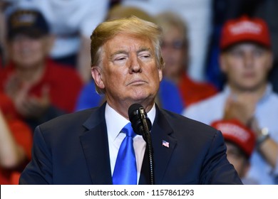 WILKES-BARRE, PA - AUGUST 2, 2018: President Donald Trump with a serious look as he delivers a speech at a campaign rally held at the Mohegan Sun Arena.