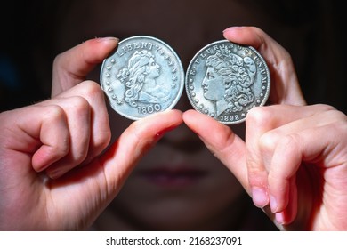 I Will Be Rich! Close Up Old US Dollar Coins In Front Of Eye As Symbol Of Love To Money And Strong Motivation. Horizontal Image.