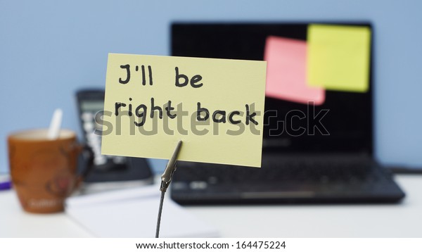 I will\
be right back written on a memo at the\
office