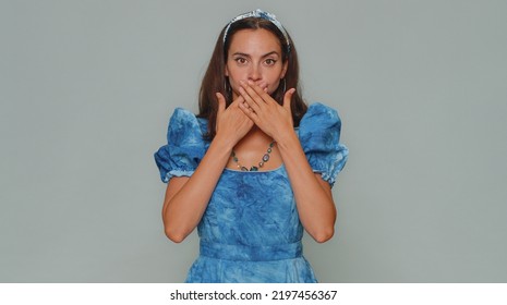 I Will Not Say Anyone. Frightened Young Woman Closing Her Mouth With Hand, Looking Intimidated Scared At Camera, Gestures No, Refusing To Tell Terrible Secret, Unbelievable Truth. Adult Female Girl