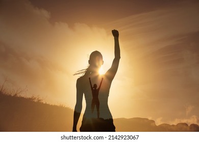 Will Power. Strong Young Woman High On A Mountain With Fist Up To The Sky Feeling Inspired Victorious. Double Exposure. 