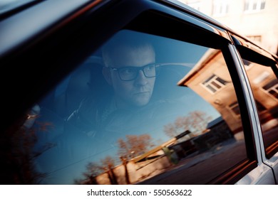will rub the driver of the car through  glass