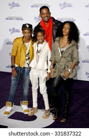 Will Smith, Jada Pinkett Smith, Jaden and Willow Smith at the Los Angeles Premiere of "Justin Bieber: Never Say Never" held at the Nokia Theatre L.A. Live in Los Angeles, USA on February 8, 2011. 