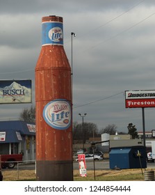 Willard, MO/USA - Circa November 2018.  Miller Light Bottle And Other Advertisements

