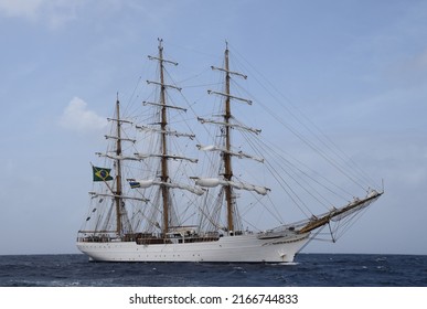 Willemstad, Curacao - June 12, 2022: Cisne Branco on high seas of the coast seen from the ocean; sail away with during the Velas Latinoamérica Curaçao 2022 festival in Curacao