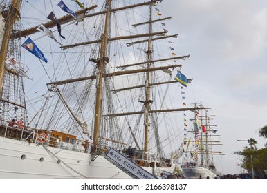 Willemstad, Curacao - June 9, 2022: two tall ships Cisne Branco and ARM Cuauhtémoc on display at Annabaai, Willemstad skyline in the background during the Velas LatinoAmerica 2022 festival in Curacao