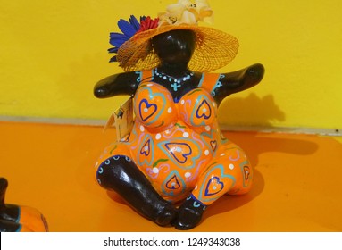 Willemstad, Curacao - November 16, 2018 - A Colorful Chichi Doll At An Art Studio