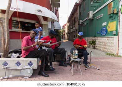 WILLEMSTAD, CURACAO - OCT 11TH 2014: Street Musicians In The Streets Of Willemstad, Curaçao. 2014.