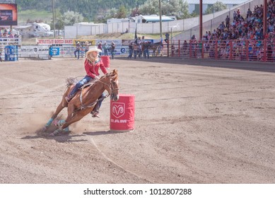 Williams Lake, British Columbia/Canada - July 2, 2016: Horse And Rider Cut Around The Second Barrel During The Barrel Racing Competition At The 90th Williams Lake Stampede