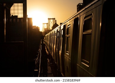 Williamsburg Bridge subway train during sunset - Powered by Shutterstock