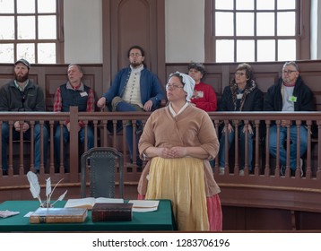 Williamsburg, VA, USA --  January 9, 2019. Actors In Period Costume, And Surrounded By Tourists, Put On A Mock Trial In Colonial Williamsburg.