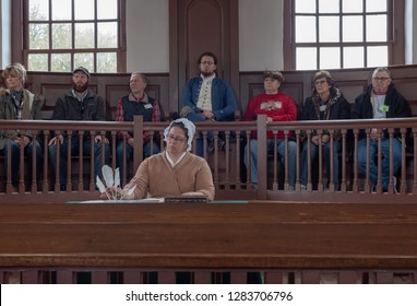 Williamsburg, VA, USA --  January 9, 2019. Actors In Period Costume, And Surrounded By Tourists, Stage A Mock Trial In Colonial Williamsburg.