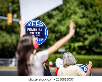 WILLIAMSBURG, VIRGINIA USA - October 1, 2021: Scenes From The Women's March Sponsored By Williamsburg JCC Indivisible At The James City County Courthouse.