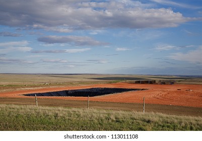  WILLISTON, ND - MAY 3: Oil fields are shown on May 3, 2010 near Williston, ND. The Bakken Formation has led to massive development and job creation in North Dakota according to a news source